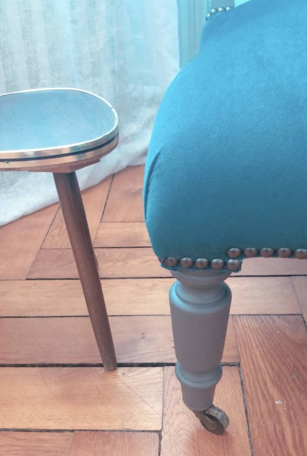 Velvet and studded armchair