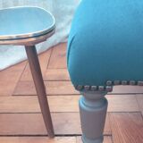 Velvet and studded armchair