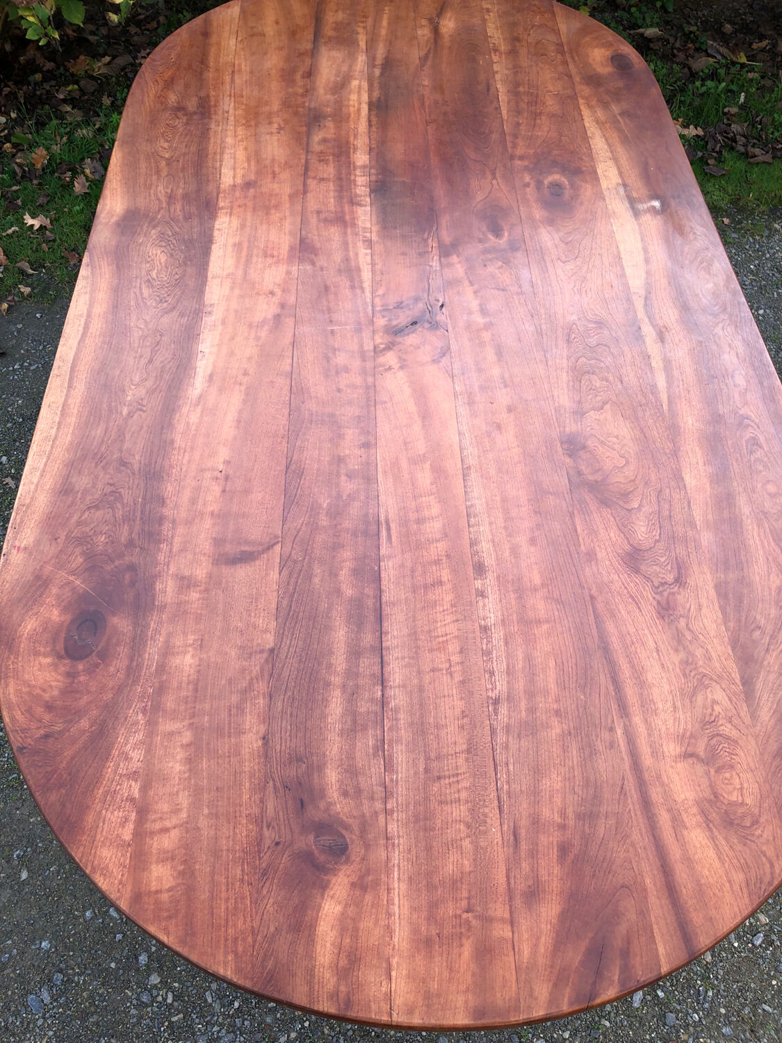 Antique cherry wood farmhouse table with rounded ends