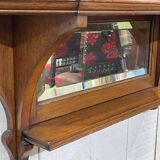 Early 20th-century English wall shelf in walnut.