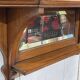 Early 20th-century English wall shelf in walnut.
