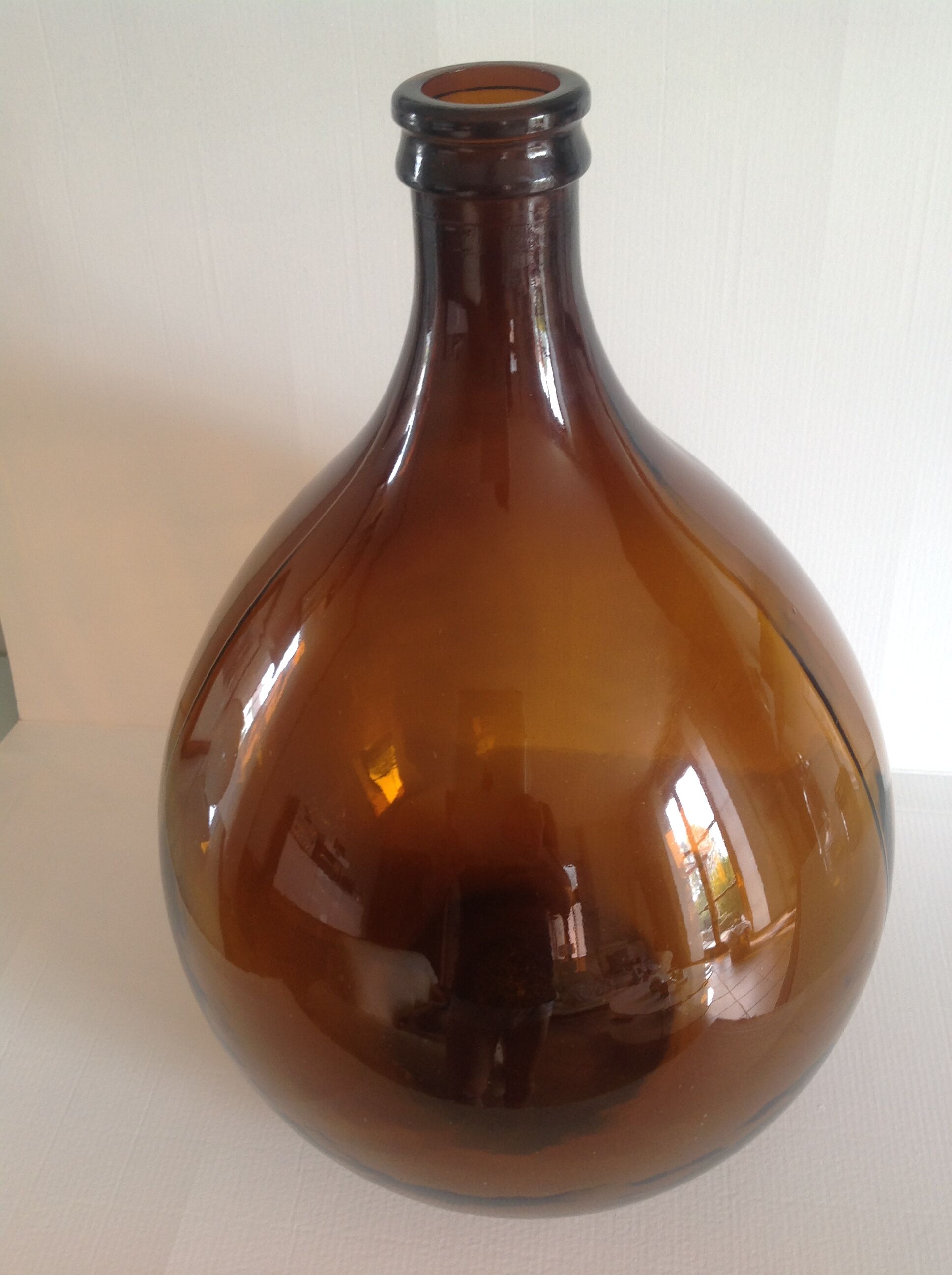 Old demijohn bonbonne smoked glass