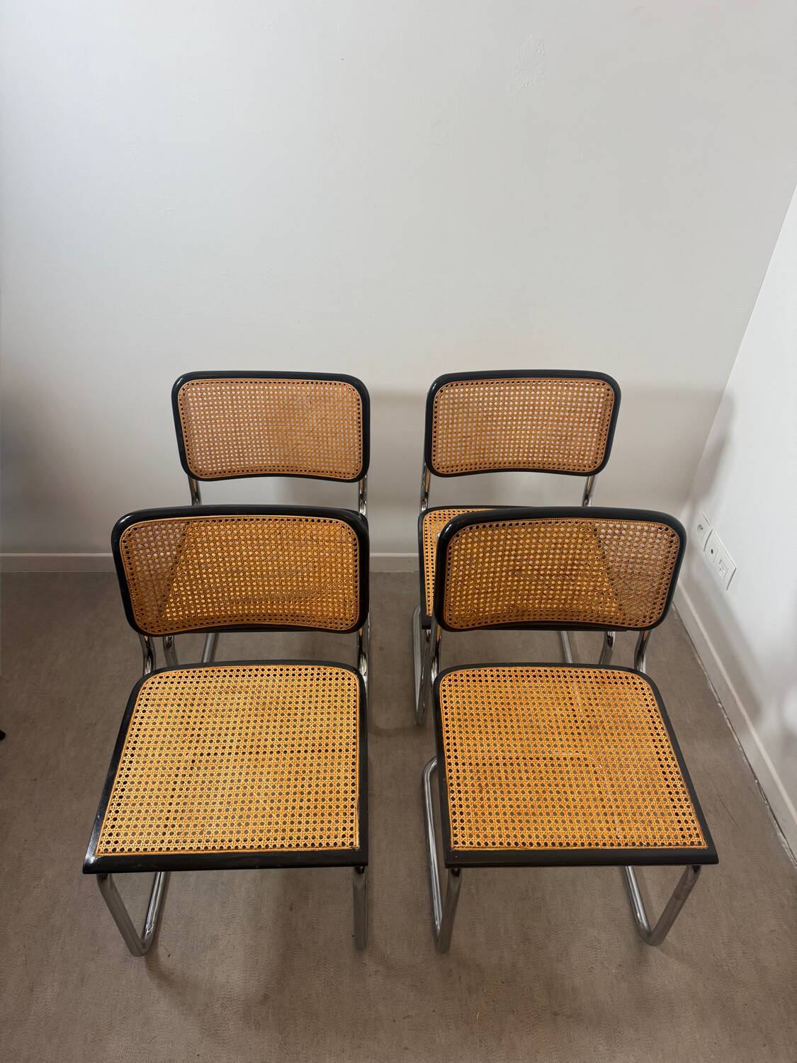 Set of four Marcel Breuer Cesca chairs made in Italy.