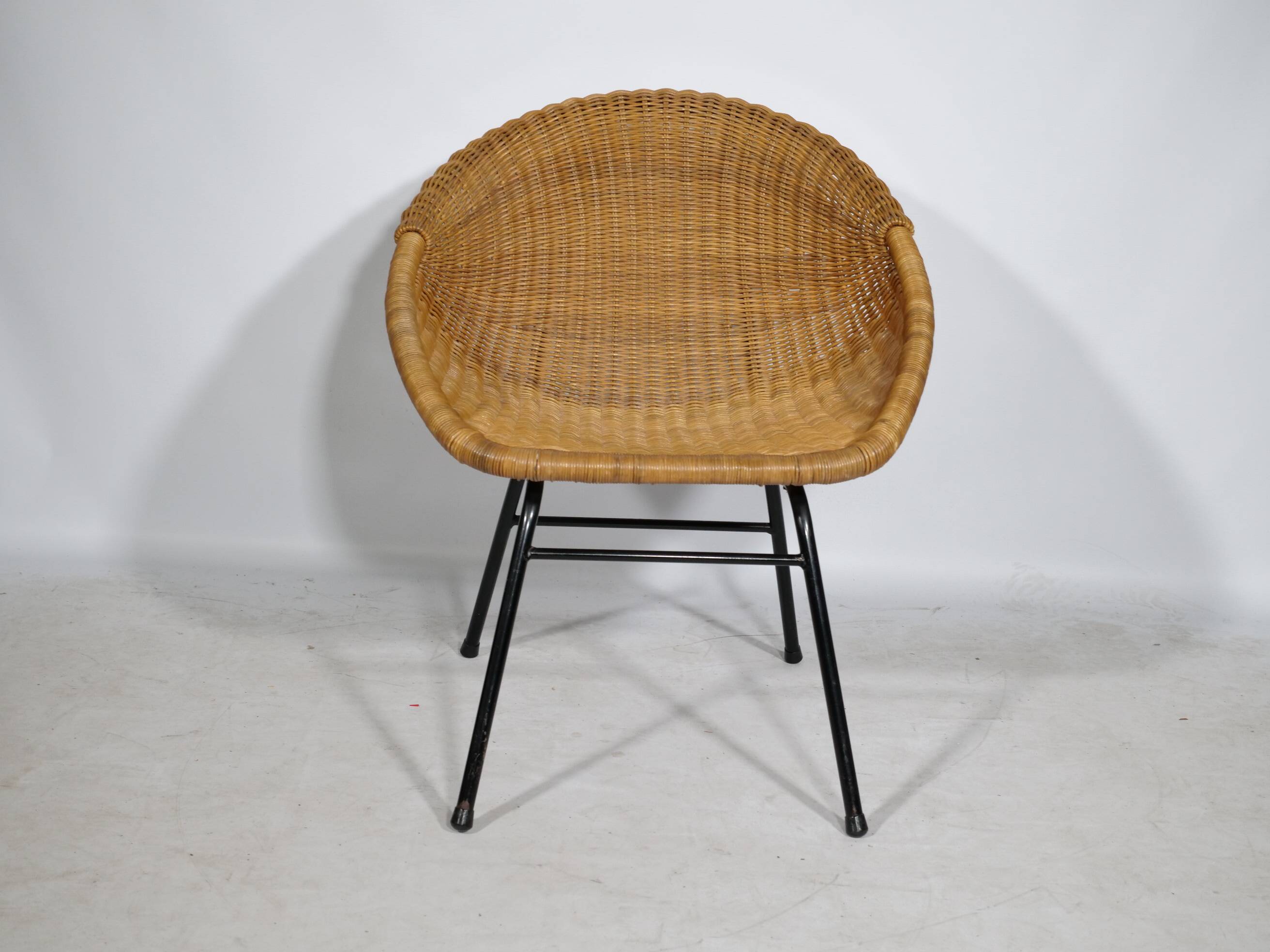 Woven rattan armchair from the 1960s