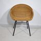 Woven rattan armchair from the 1960s