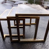 Pull-out tables in brass