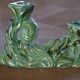 Pair of iridescent green ceramic Art Deco candlesticks