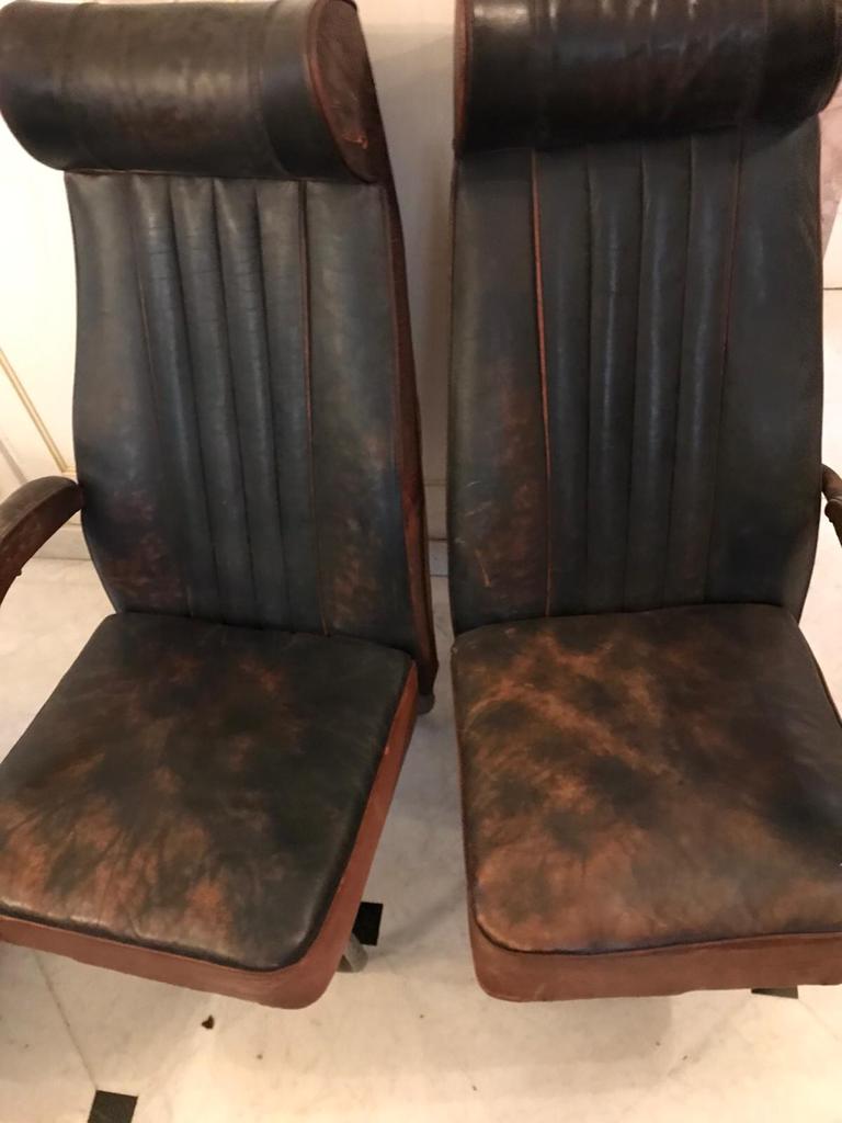 Vintage 1950s leather double-plane bus armchairs