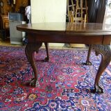 Nineteenth round table in carved mahogany with extension Ø 133 cm