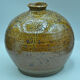 Vase ball onion in pyrity sandstone signed
