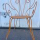 Orange wrought iron chair
