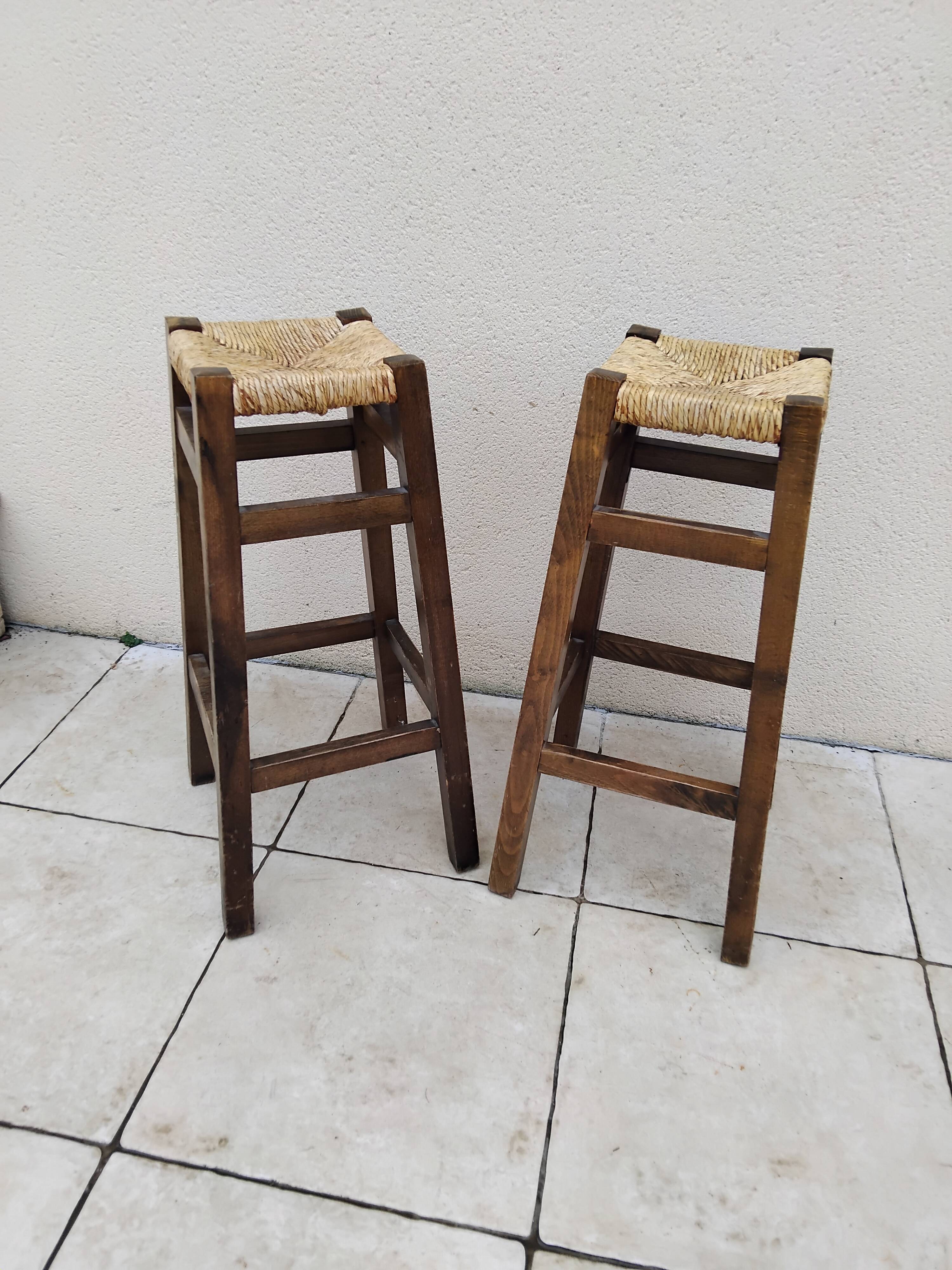Pair of vintage stools with straw seats