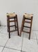 Pair of vintage stools with straw seats