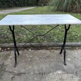 Old bistro table by Berc in Paris. Wrought iron, marble top.