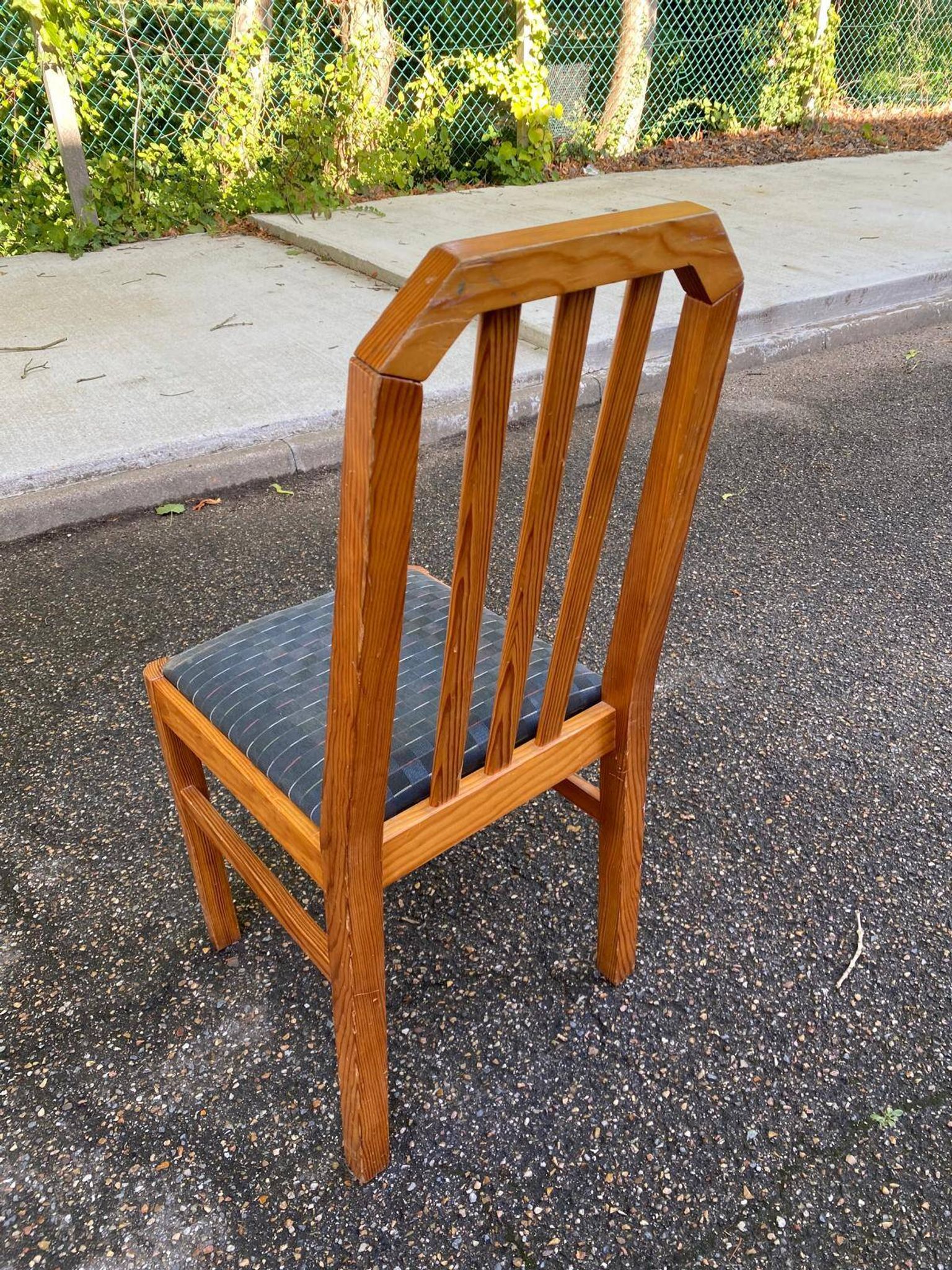 4 solid wood and blue fabric dining chairs with bars