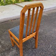 4 solid wood and blue fabric dining chairs with bars