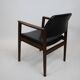 Vintage armchair 1960 black imitation leather and oak frame germany