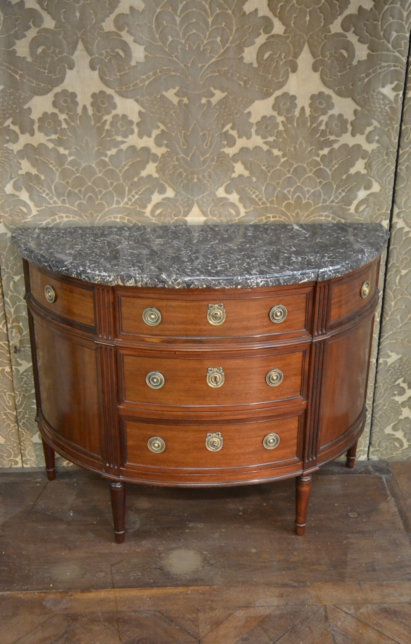 Louis XVI-style half-moon mahogany chest of drawers