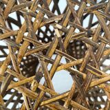 Rattan and cane stool in the shape of a Tam Tam stool