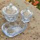 Lot consisting of 3 glassware, lavender blue, two jars with lids and a pocket emptier, vintage