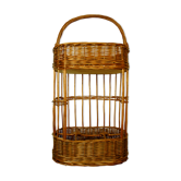 Wicker basket carries vintage nomadic bar bottles