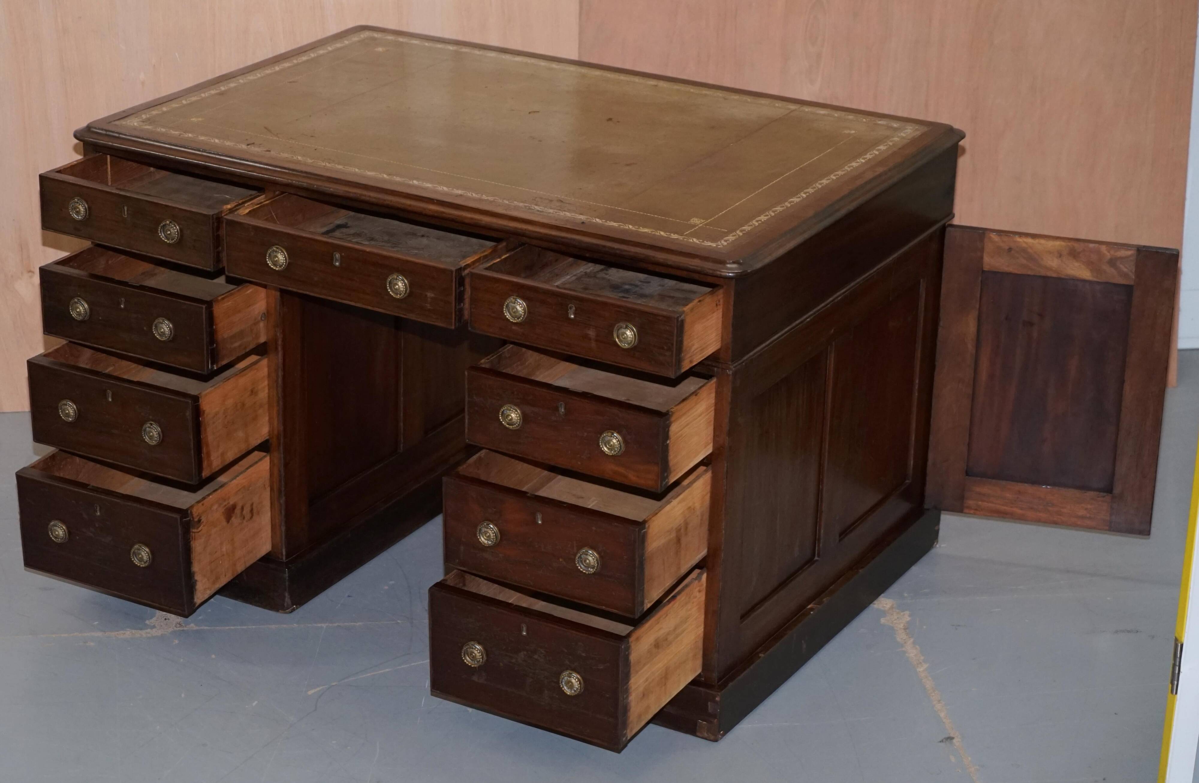 George III double-sided partner's desk in walnut circa 1780 with original handles.