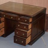 George III double-sided partner's desk in walnut circa 1780 with original handles.