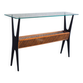 Table console ébénisée italienne des années 1950 avec plateau en verre et panier en treillis.