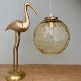 Vintage globe pendant light in amber glass