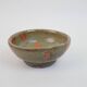 Small bowl in water green glazed ceramic with coral pink pattern