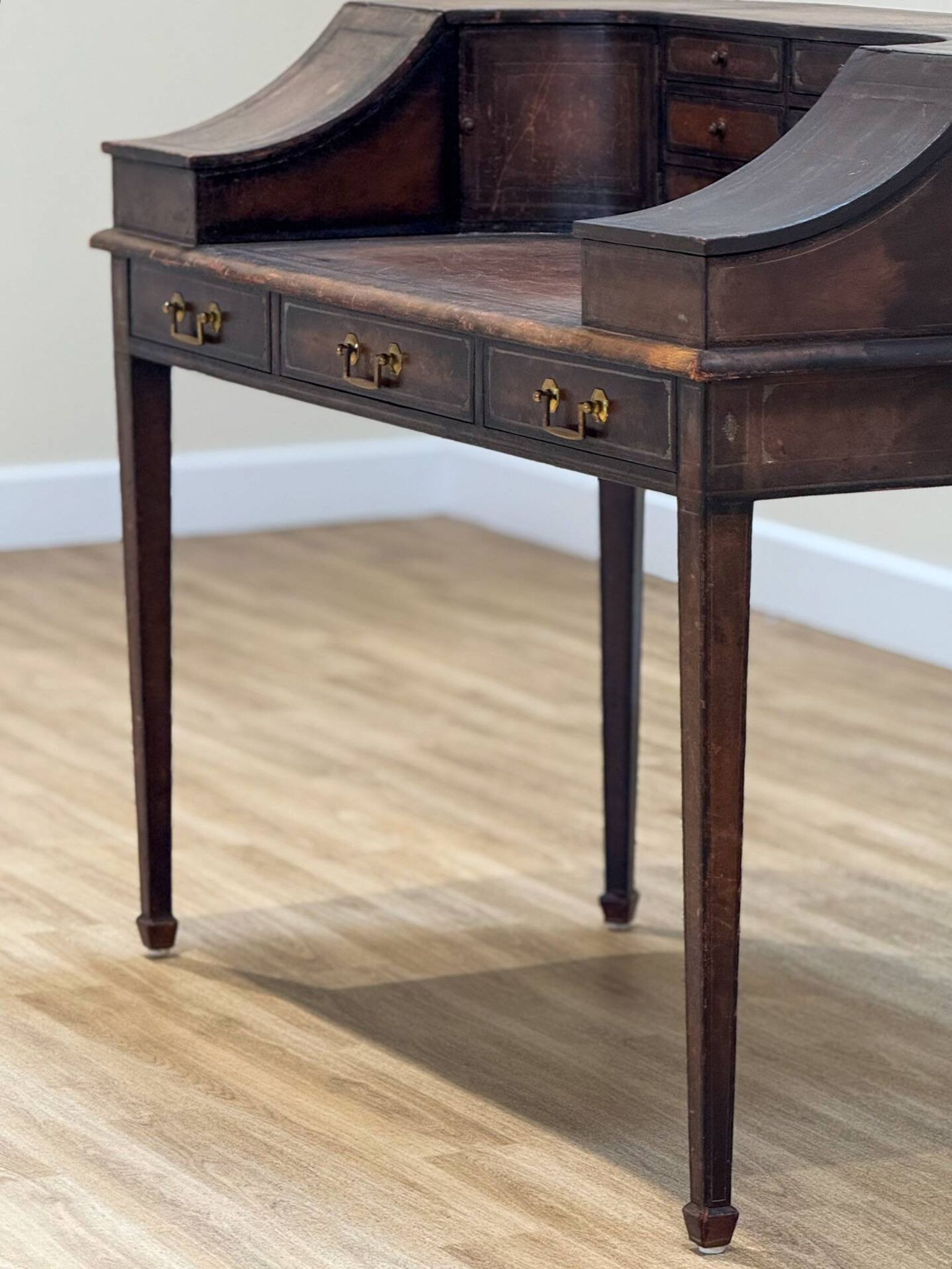 Antique desk by Charles Lowe & Sons