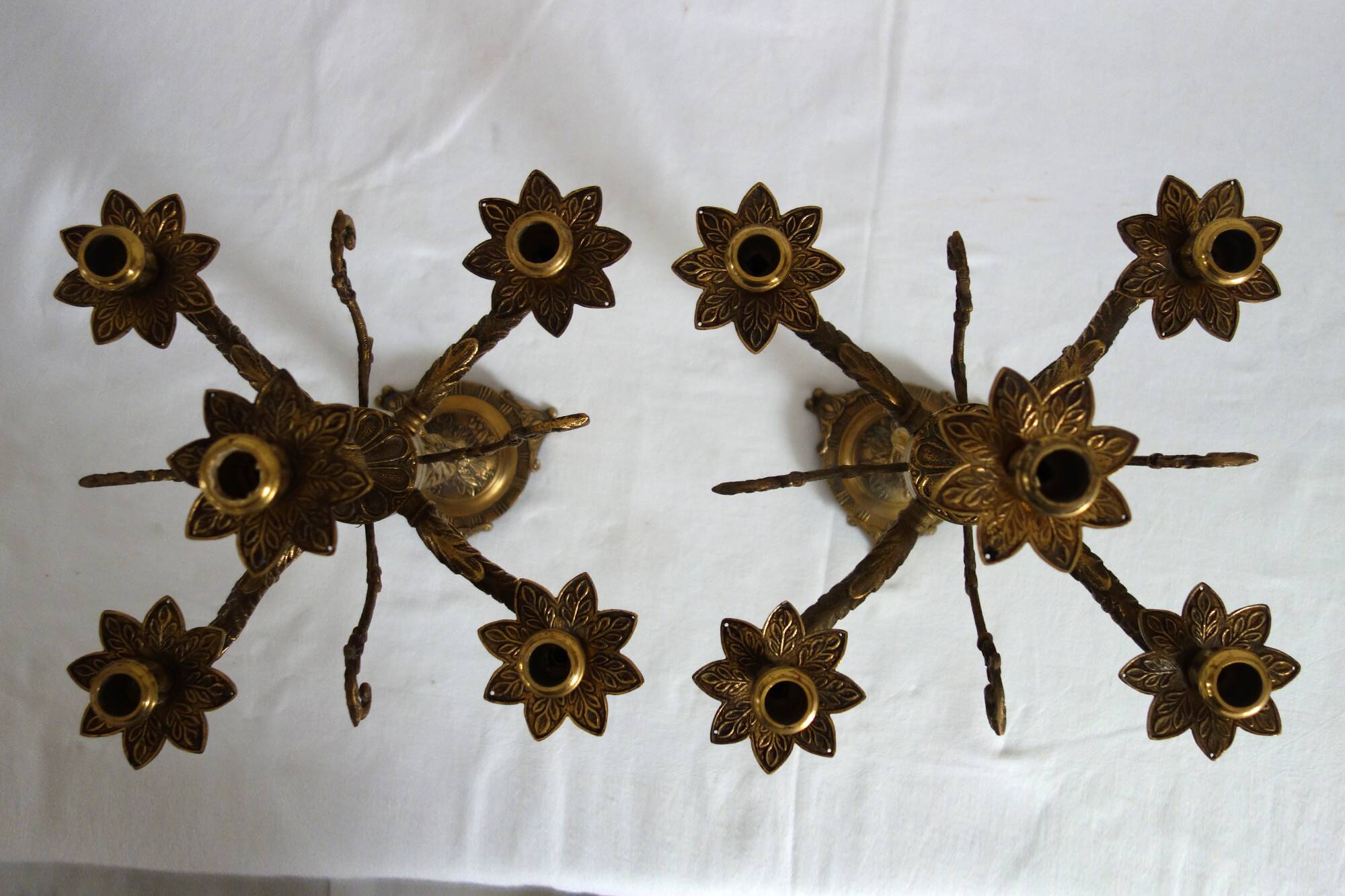 Pair of cherub candlesticks in gilded bronze early 20th century
