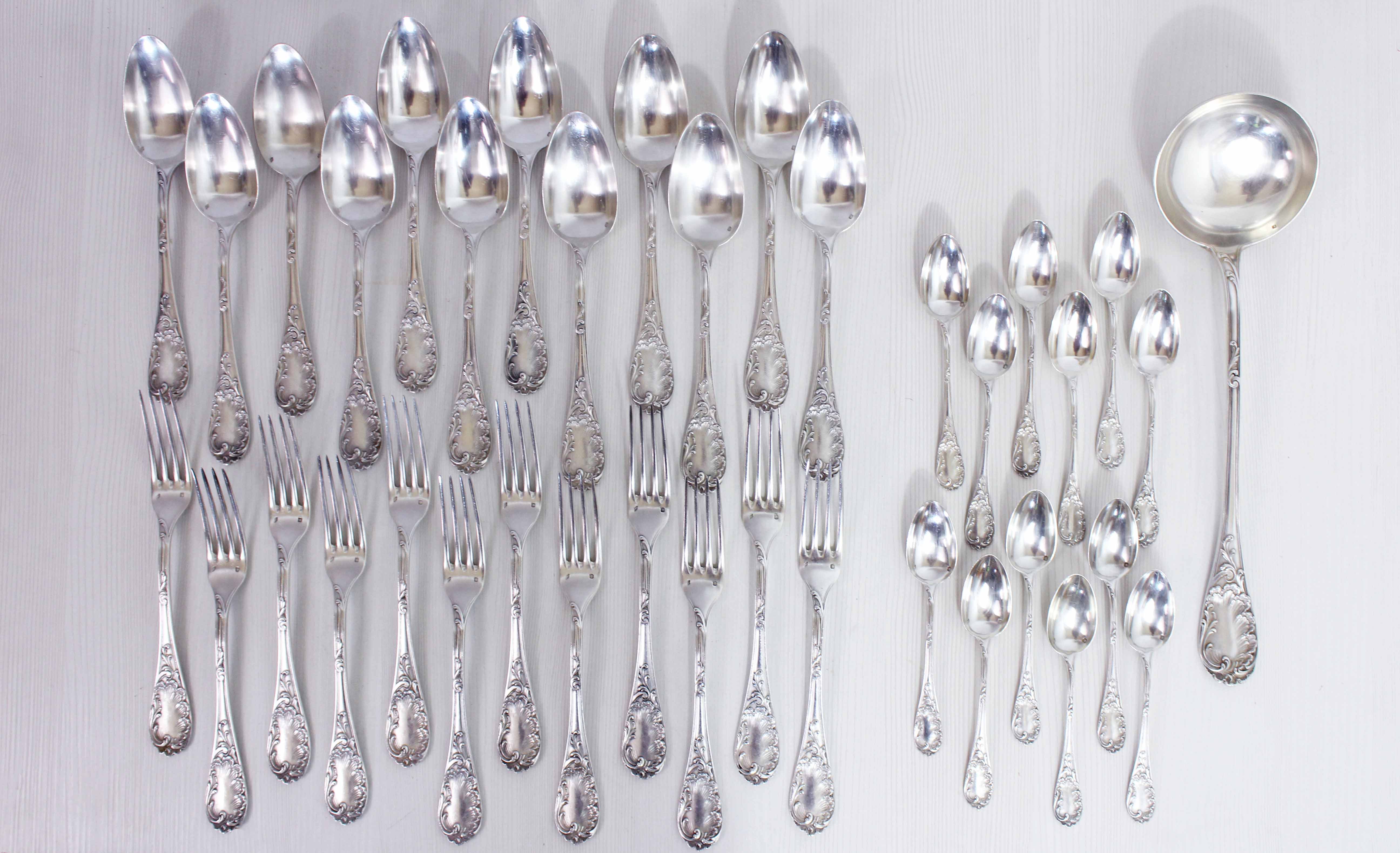 Set de 37 couverts Emile Puiforcat en argent massif