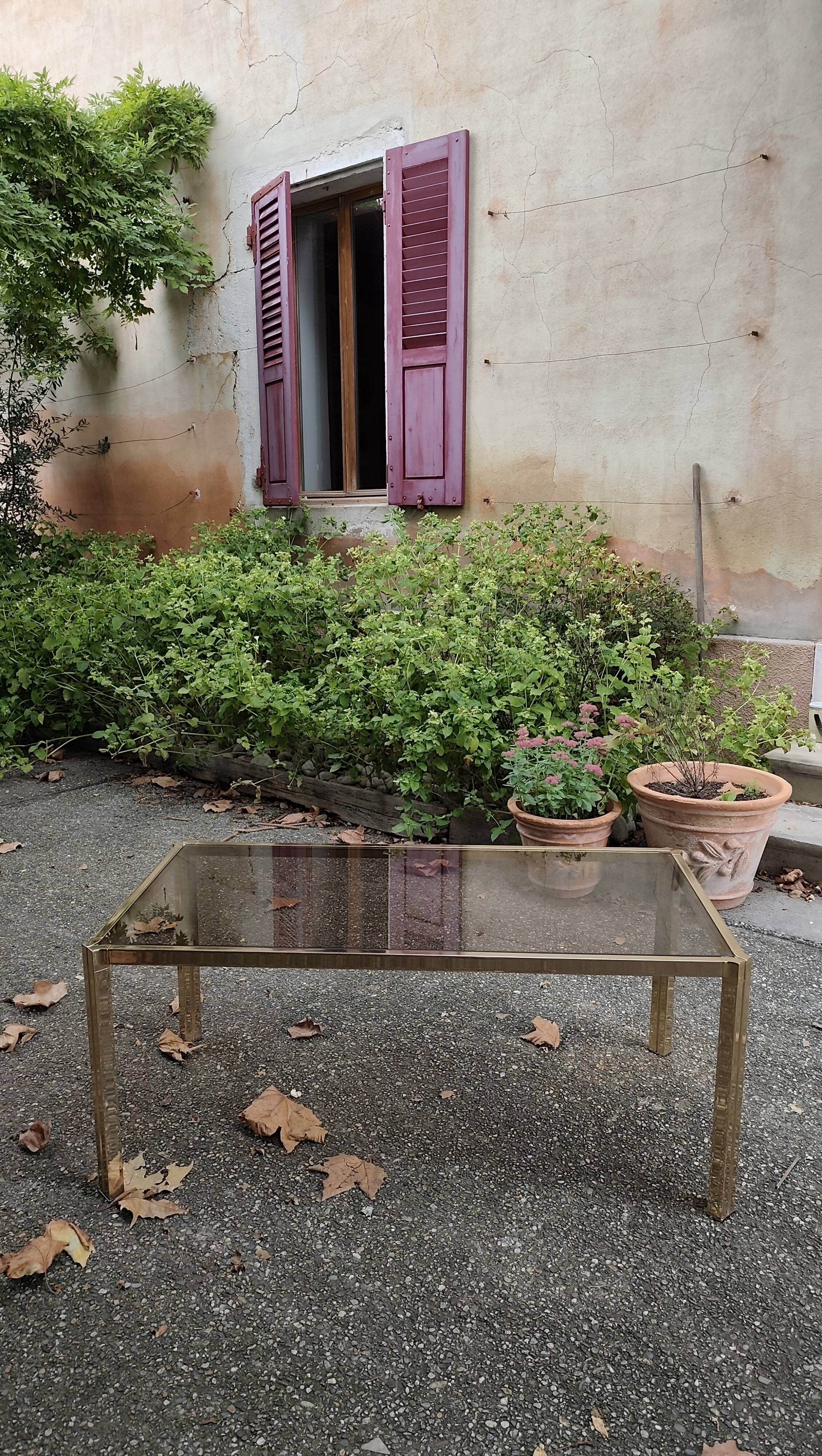 Brass coffee table with smoked glass top