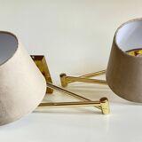 articulated brass and velvet wall light