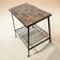 Vintage metal side table/plant table with ceramic accent