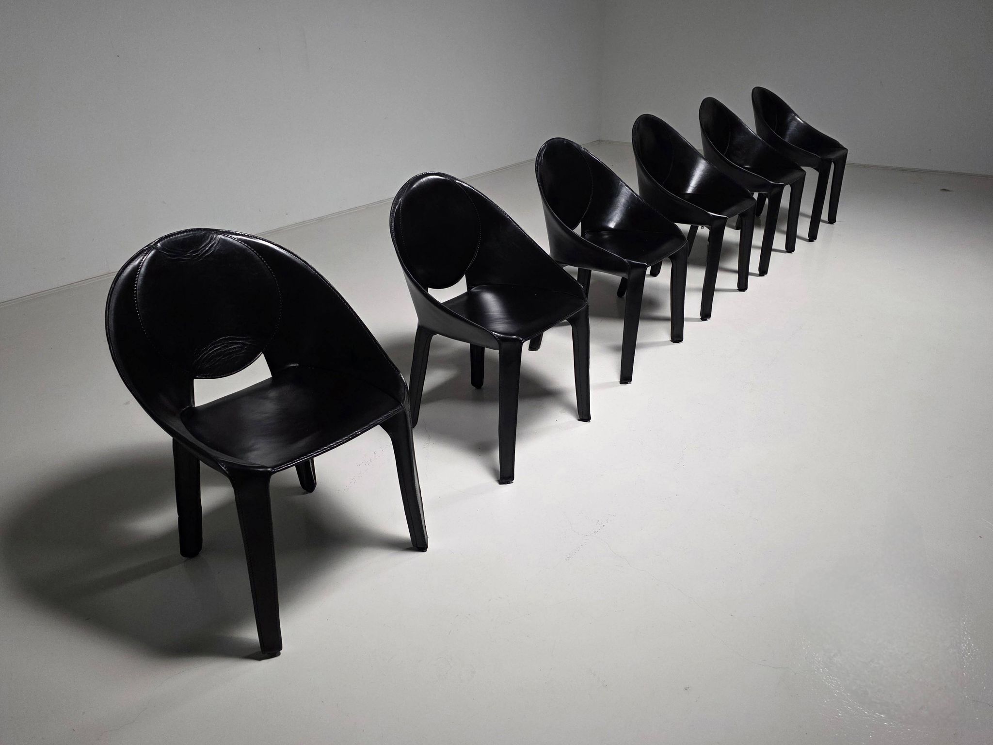 Set of six "Lira" dining chairs by Mario Bellini for Cassina, Italy, 1980s.