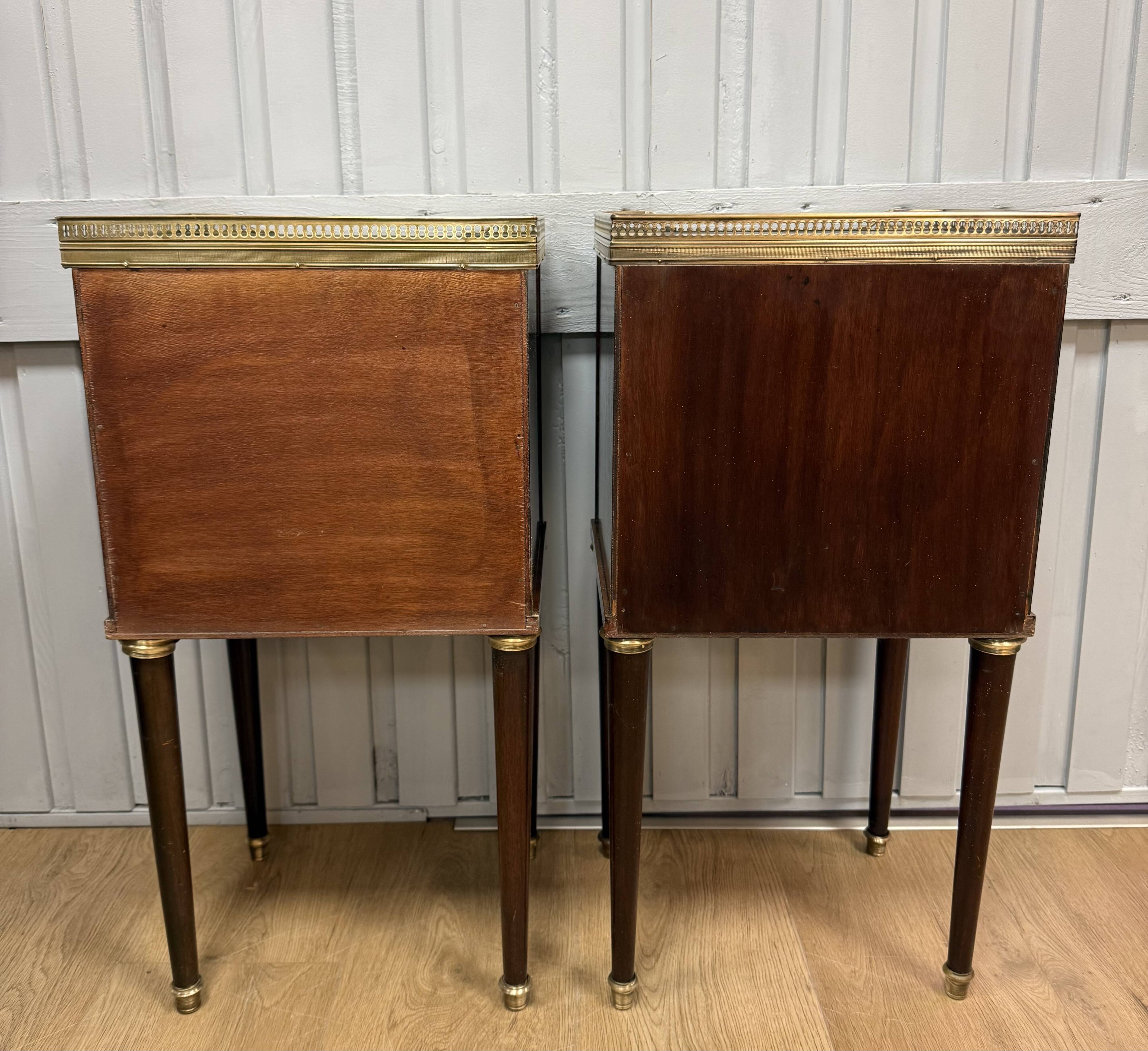 Pair of Louis XVI style bedside tables in mahogany