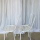 Pair of antique garden chairs, wrought iron, white paint.