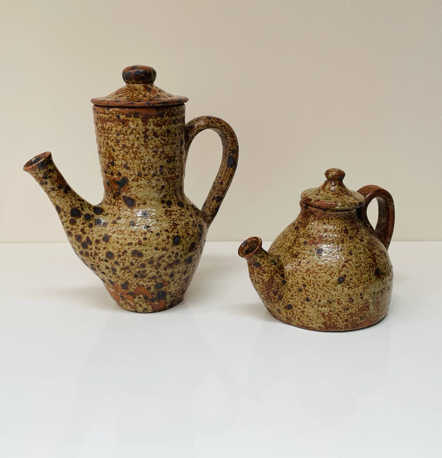 Pair of vintage brutalist ceramic teapots from the 1970s.