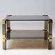 Hollywood Regency coffee table in smoked glass – Modular brass construction
