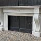Large Charles X fireplace in white Carrara marble, 19th century.