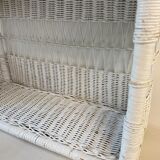 White wicker wall shelf