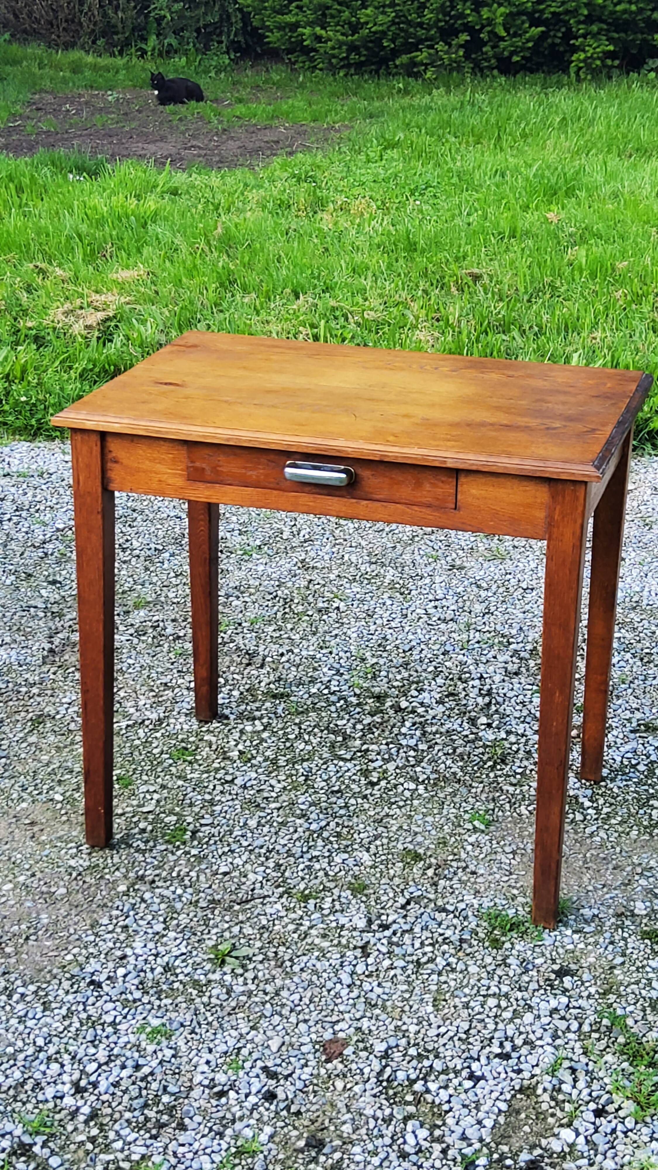 Oak writing table with spindle legs, early 20th century