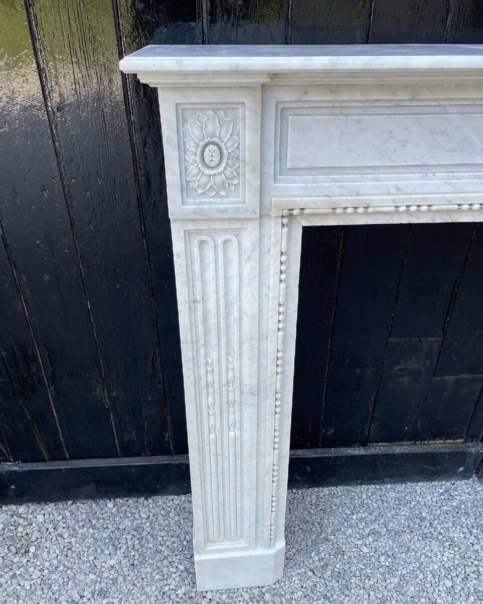 Louis XVI fireplace in Carrara marble