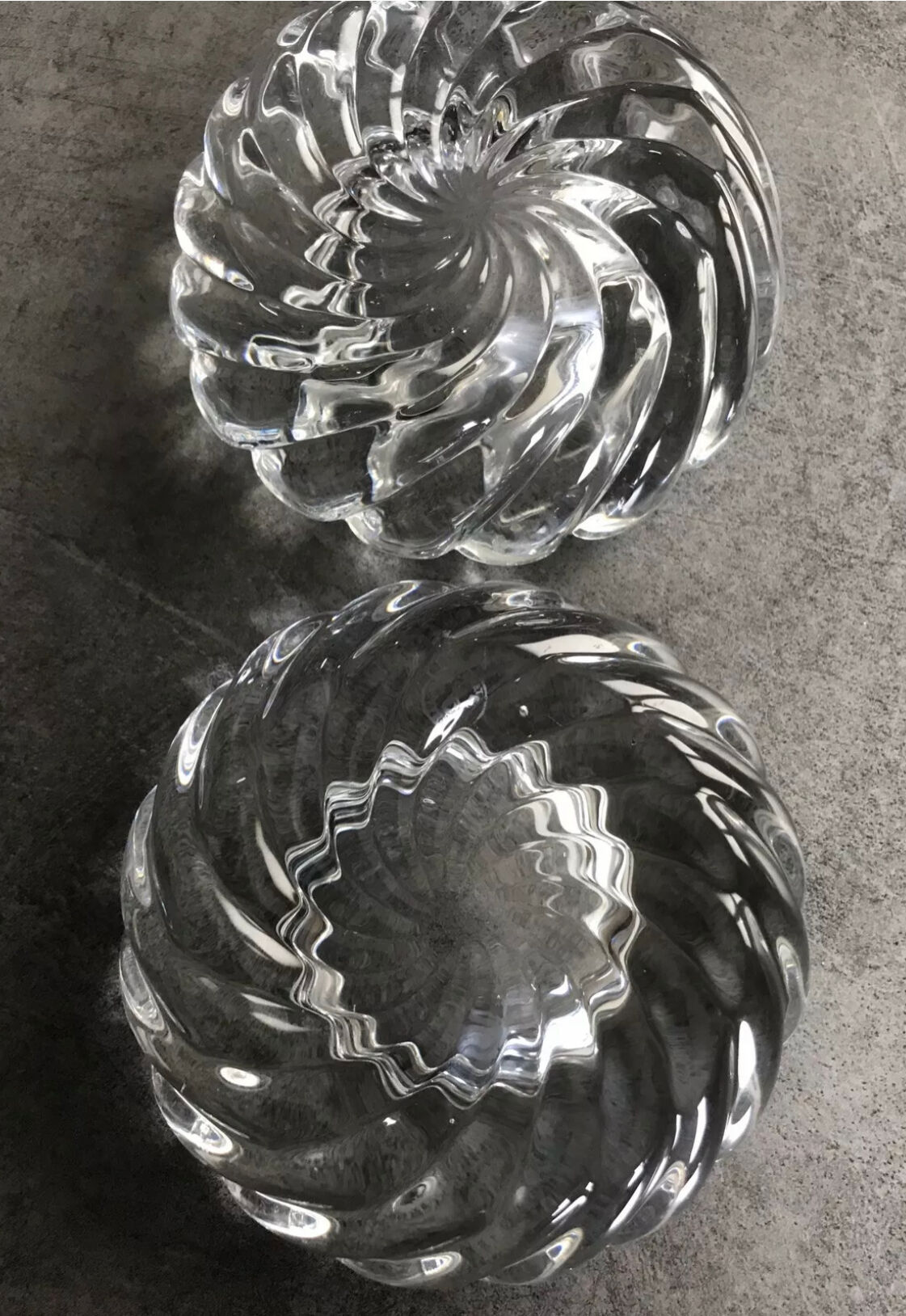 Pair of twisted round candlesticks in baccarat crystal stamped