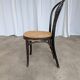 Chaise de salle à manger vintage style Thonet en bois noir et assise en cannage 1970