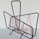 Vintage black metal magazine rack circa 19