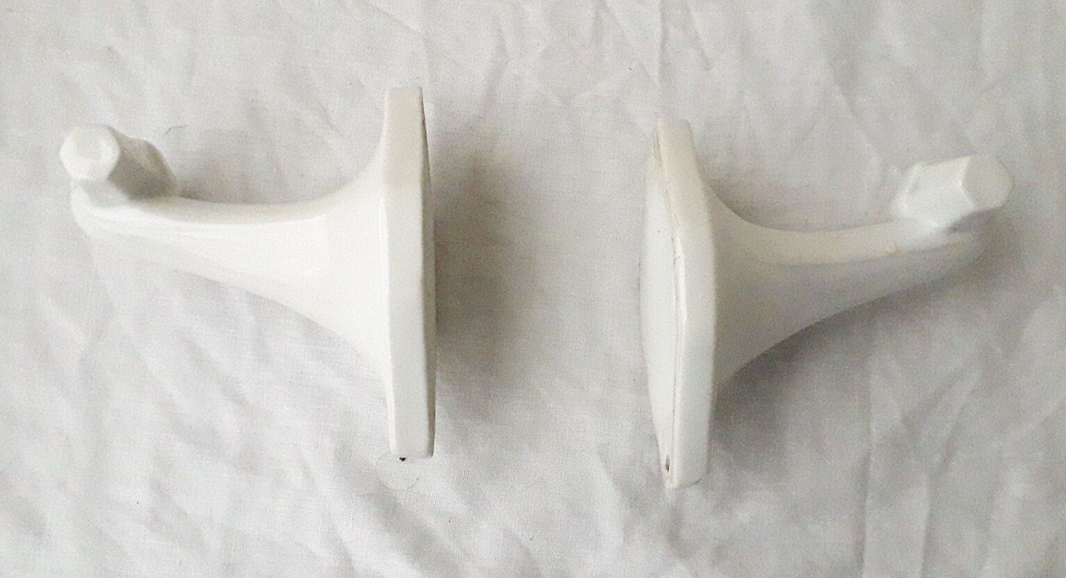 Pair of porcelain hooks