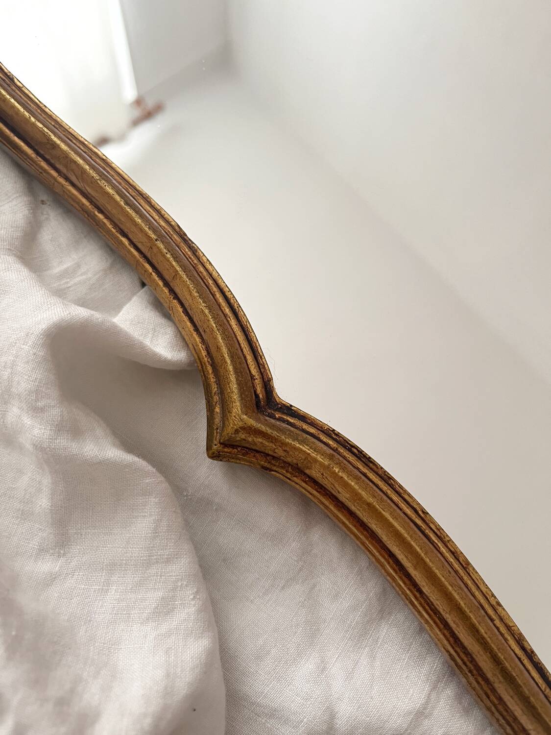 Antique Louis XV gilded mirror with vintage rocaille shell